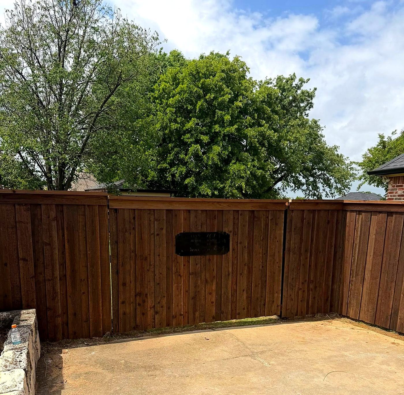 Wood privacy fence and gate installation